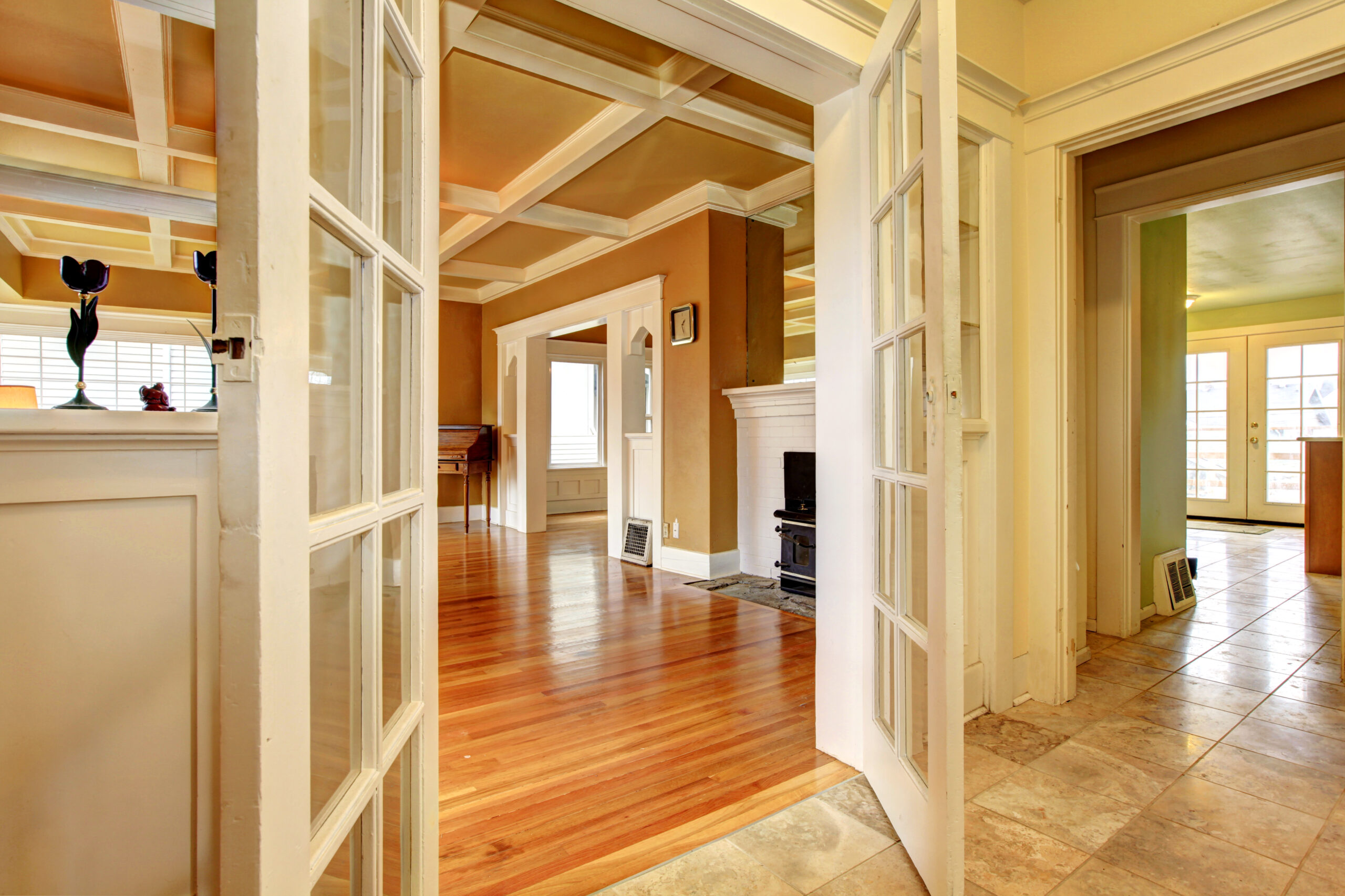 View of the empty living room from a hallway