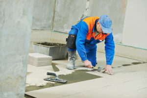 tilers at industrial floor tiling renovation